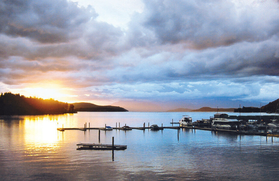 A peaceful lake view at VRI's Pend Oreille Shores Resort in Hope, Idaho.